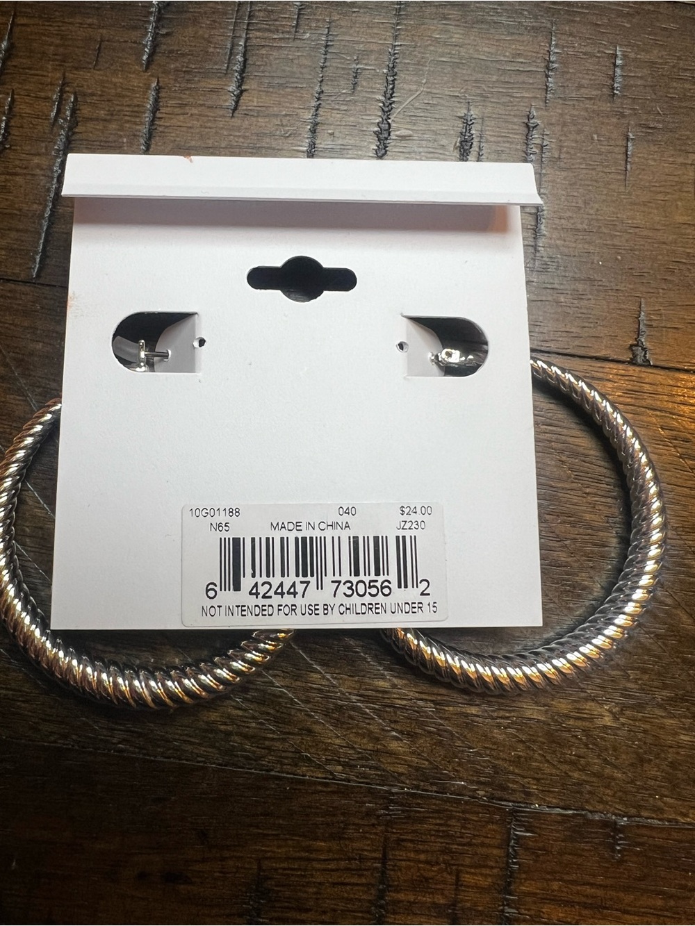 Anne Klein Twisted Silver-Tone Hoop Earrings - Picture 2 of 2